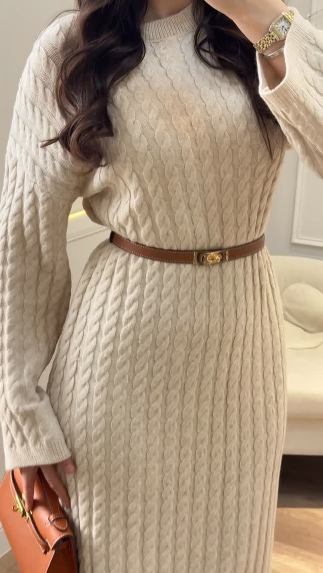 Modest Winter Outfits: 12 Ideas for Cold Days 12 A person wearing a cream cable-knit sweater dress cinched with a brown leather belt.